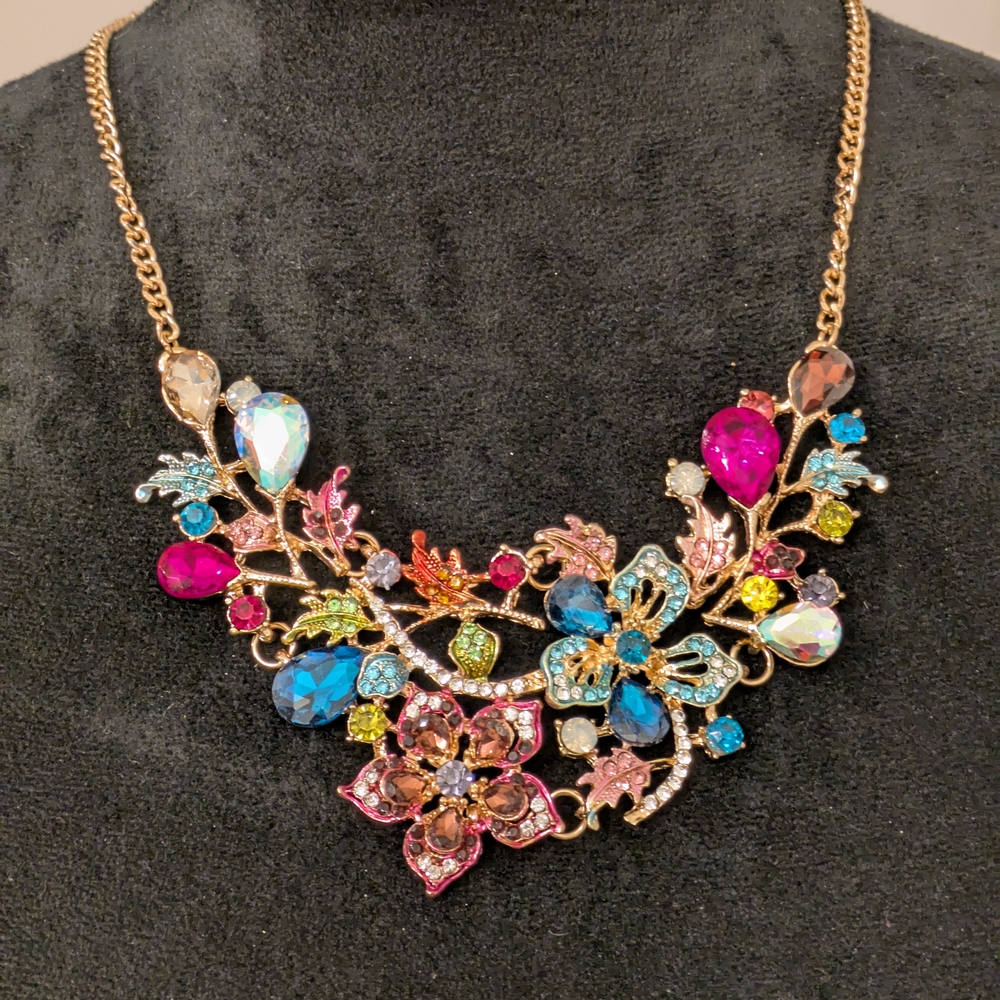 Vibrant Floral Necklace with Pink, Blue, and Gold Accents